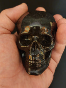 Resin skull with Yooperlite and Willemite